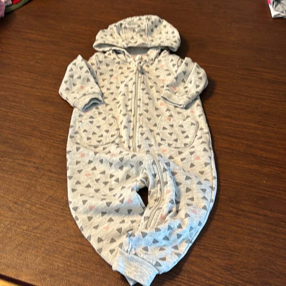 H & M 1 pc bodysuit with hood. Gray with gray & pink triangles zip front